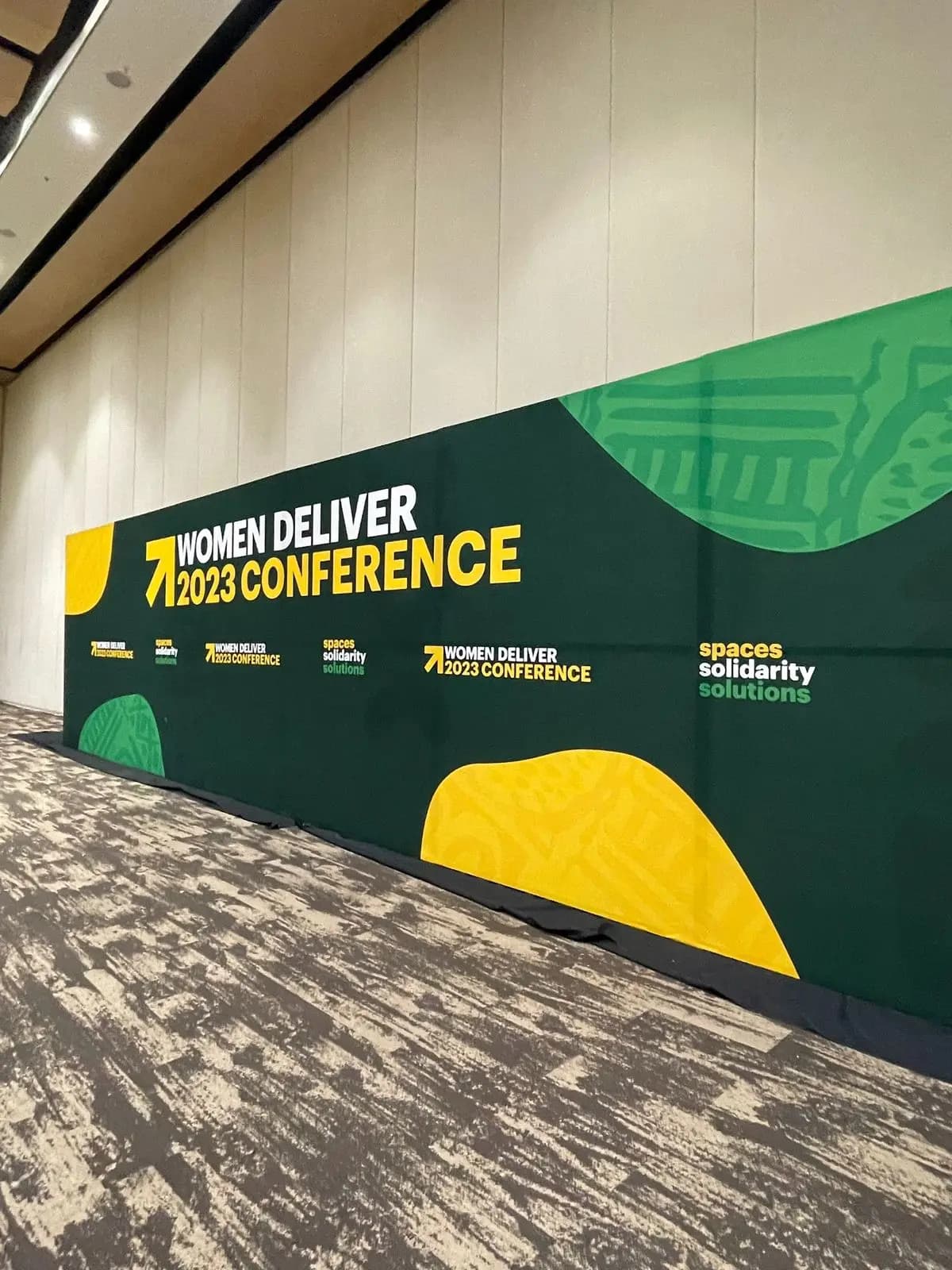 Women Deliver 2023 Conference event branding wall